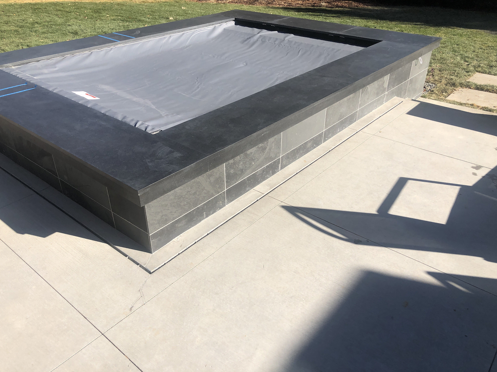 Swimming Pool Overflowing? A Functional & Elegant Drainage Solution